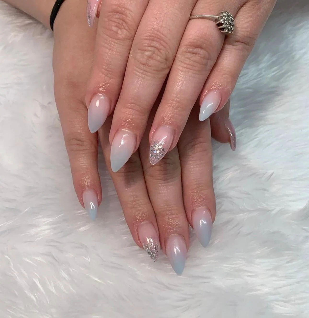 Grey ombré almond nails with silver glitter accents by Nailed by Ellie